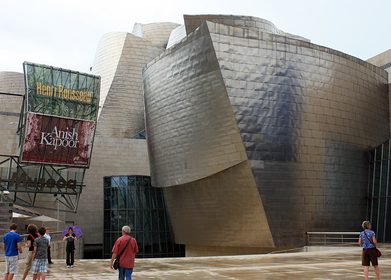 Entrance to the Guggenheim Museum. Poster exhibition and titanium plates